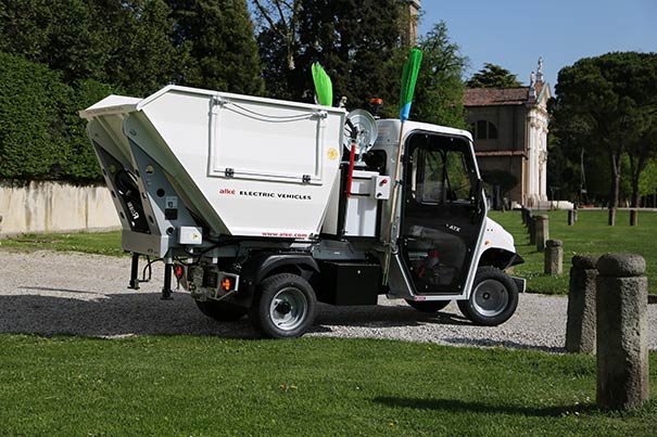 Alke' electric utility vehicle with pressure washer and waste collection body